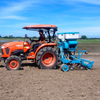 2BFGL-C pneumatic seeder and fertilizer applicator working with a small tractor